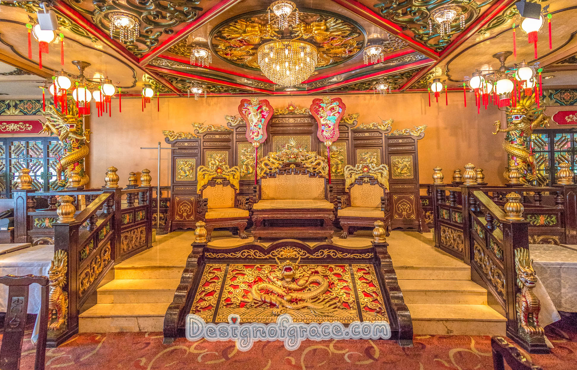 A Very elaborate gold and red throne benches at Jumbo Kingdom in Hong Kong