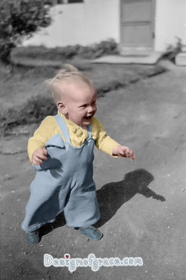old black and white photo of a baby walking coloured in by me