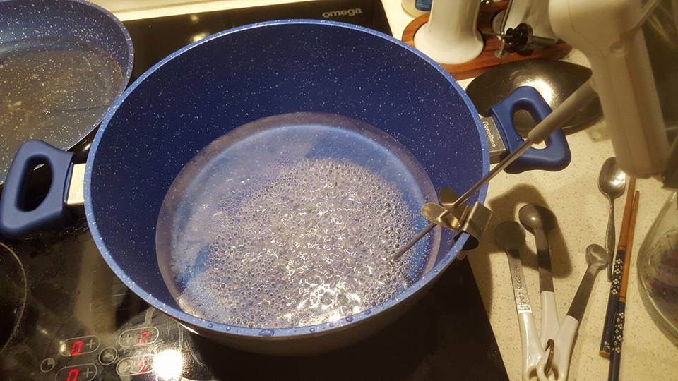 A pot DIY Glucose/Corn Syrup Substitute over the stove