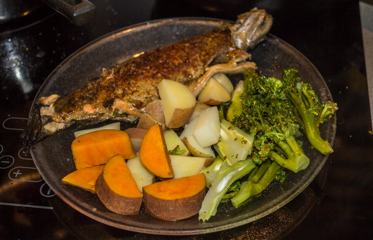 02/01/16 Garlic rosemary lemon baked trout with 3 different types of potatoes with home grown broccoli from seed