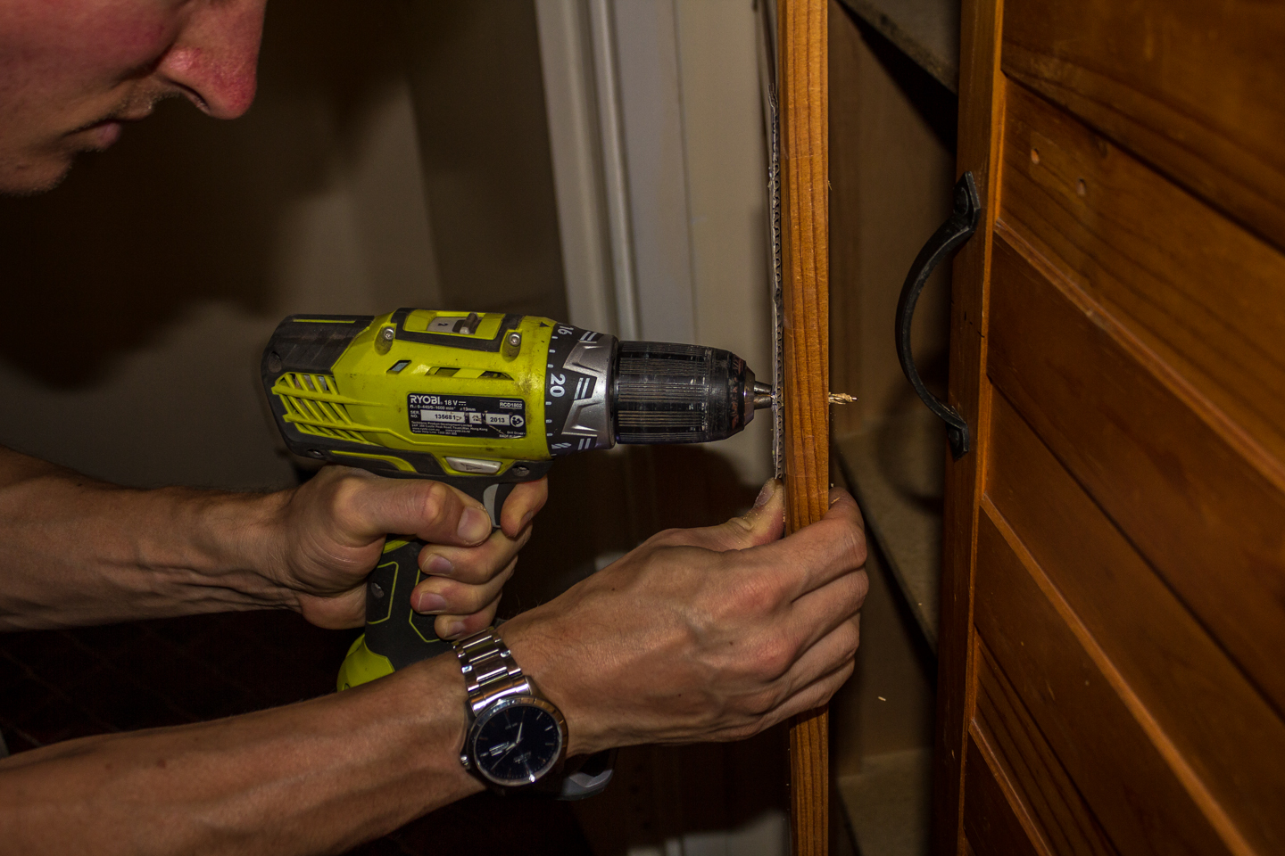 30/12/15 Day 5 [Only time we had available] Hubby drilling a hole in the door using the template