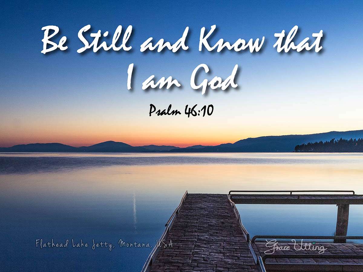 Still waters at Flathead Lake Jetty at sunset, Montana, USA  with the text ” Be Still and Know that I am God, Psalm 46:10″