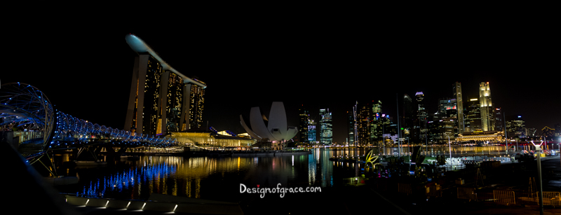 Marina Bay Sands Night Panorama with ligths reflection in the water, Singapore
