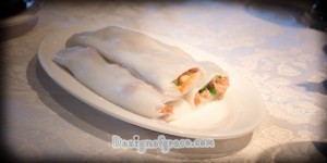 3 pieces of steamed rice roll filled with Shirmp on a white plate