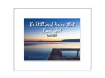 19 Still waters at Flathead Lake Jetty at sunset with orange and blue colours , Montana, USA  with the text " Be Still and Know that I am God, Psalm 46:10"