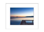 19 Still waters at Flathead Lake Jetty at sunset with orange and blue colours